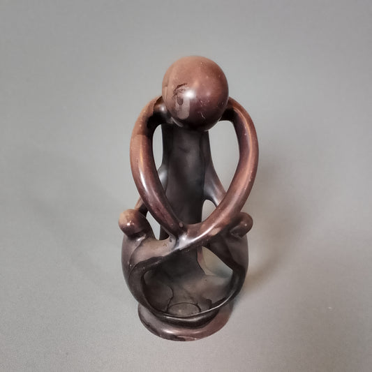 Stone sculpture, mother with children