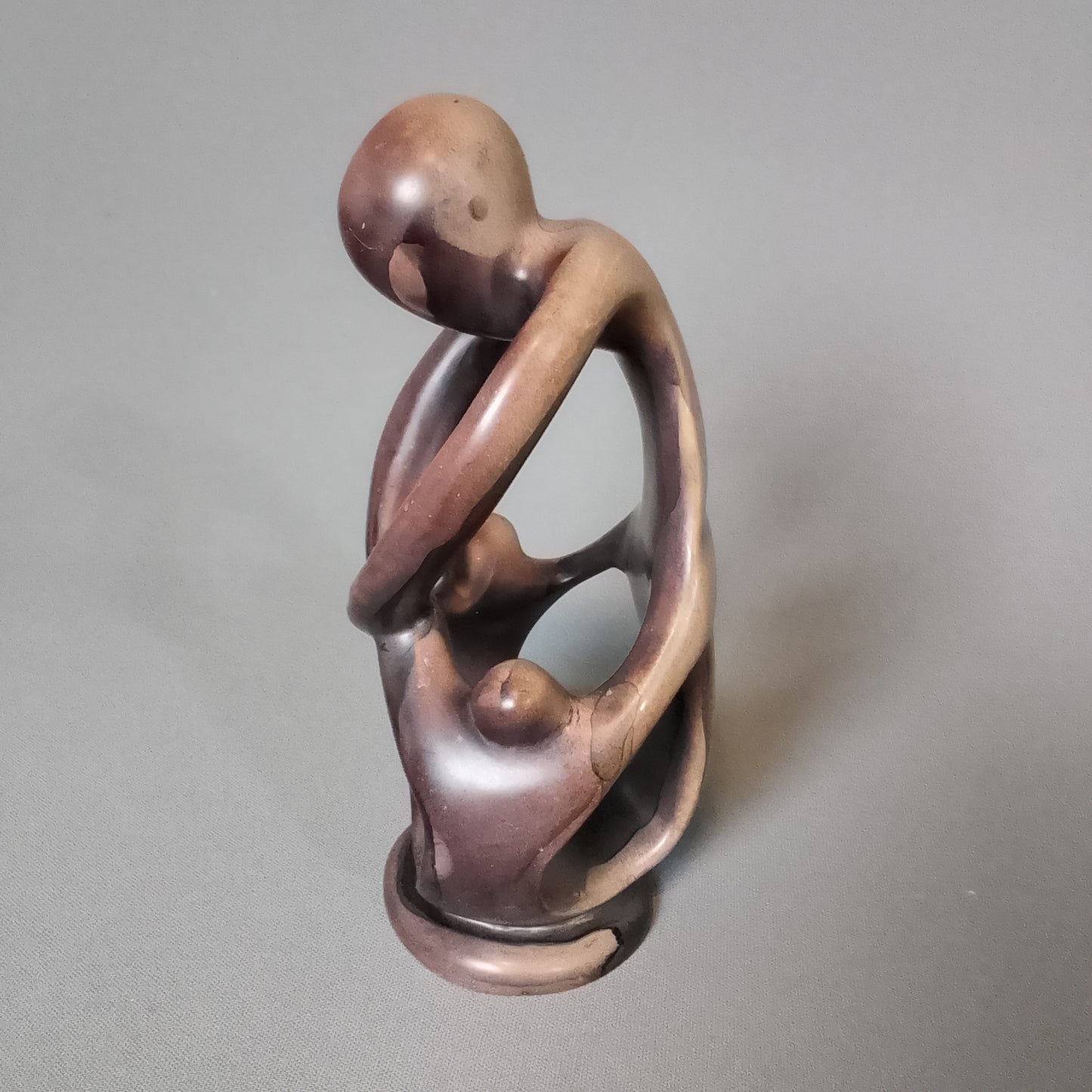 Stone sculpture, mother with children