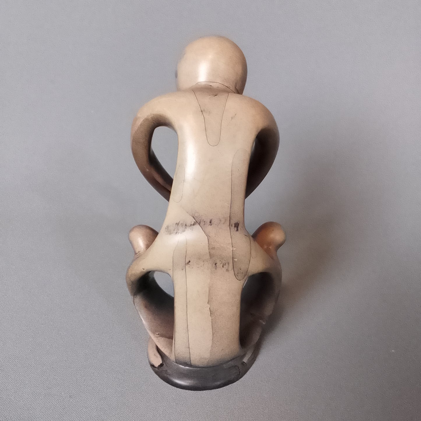 Stone sculpture, mother with children