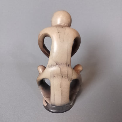 Stone sculpture, mother with children